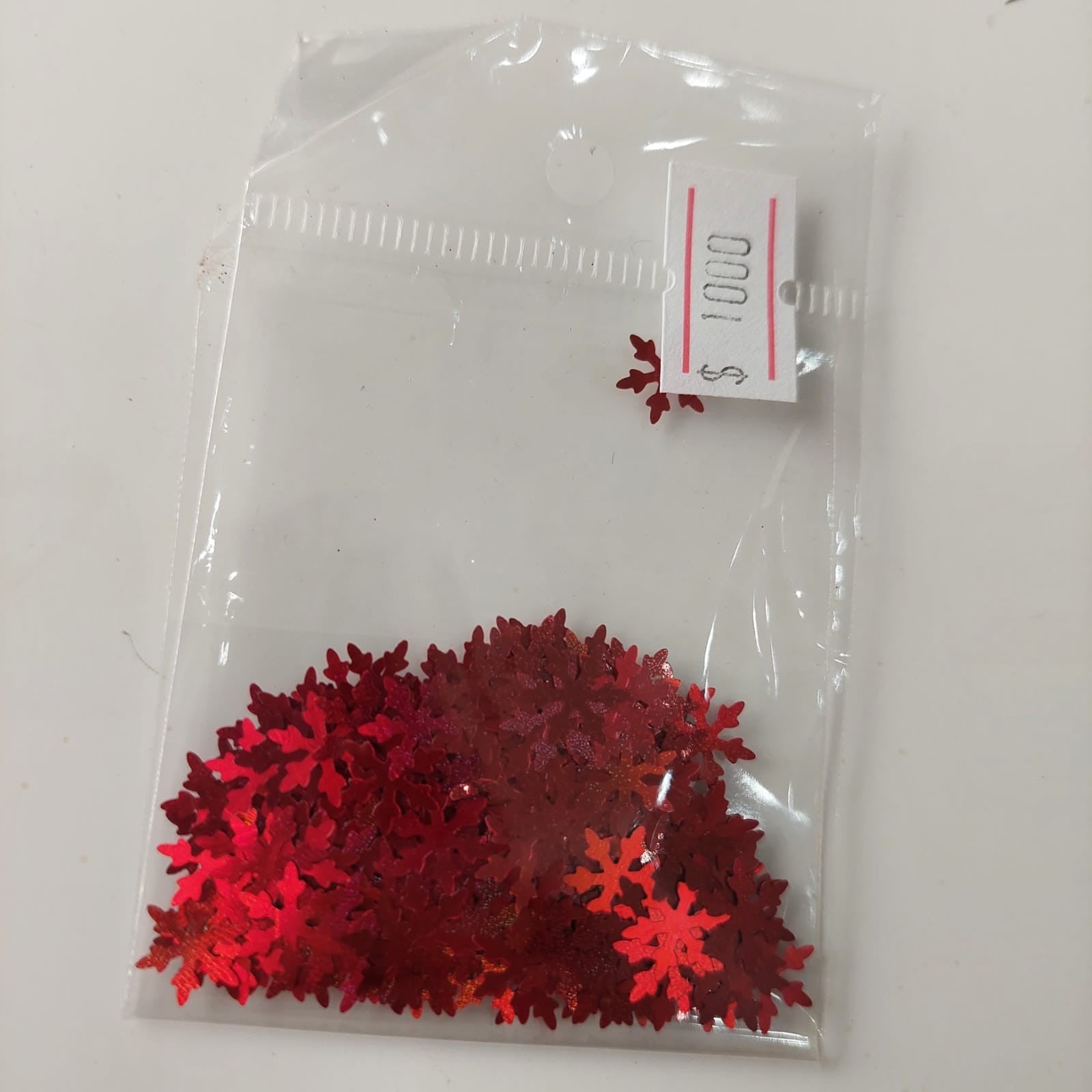 Confeti copos de nieve rojo