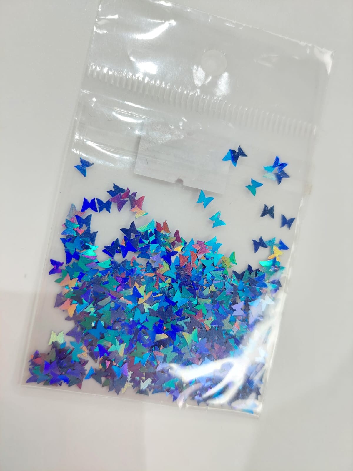 Confeti mariposa azul metalico
