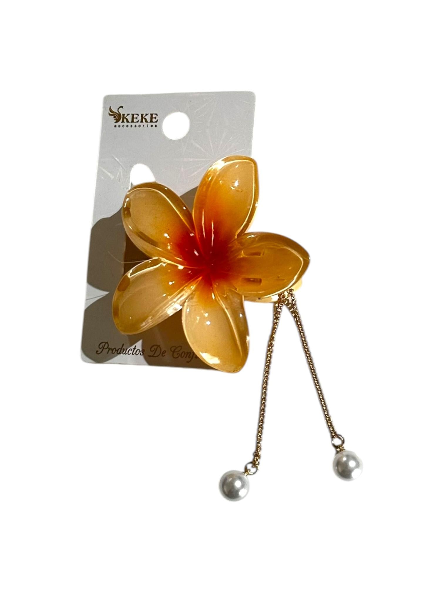 Pinza flor hawaiana con accesorio colgante