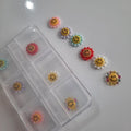 Caja de figuras 3d flores con carita