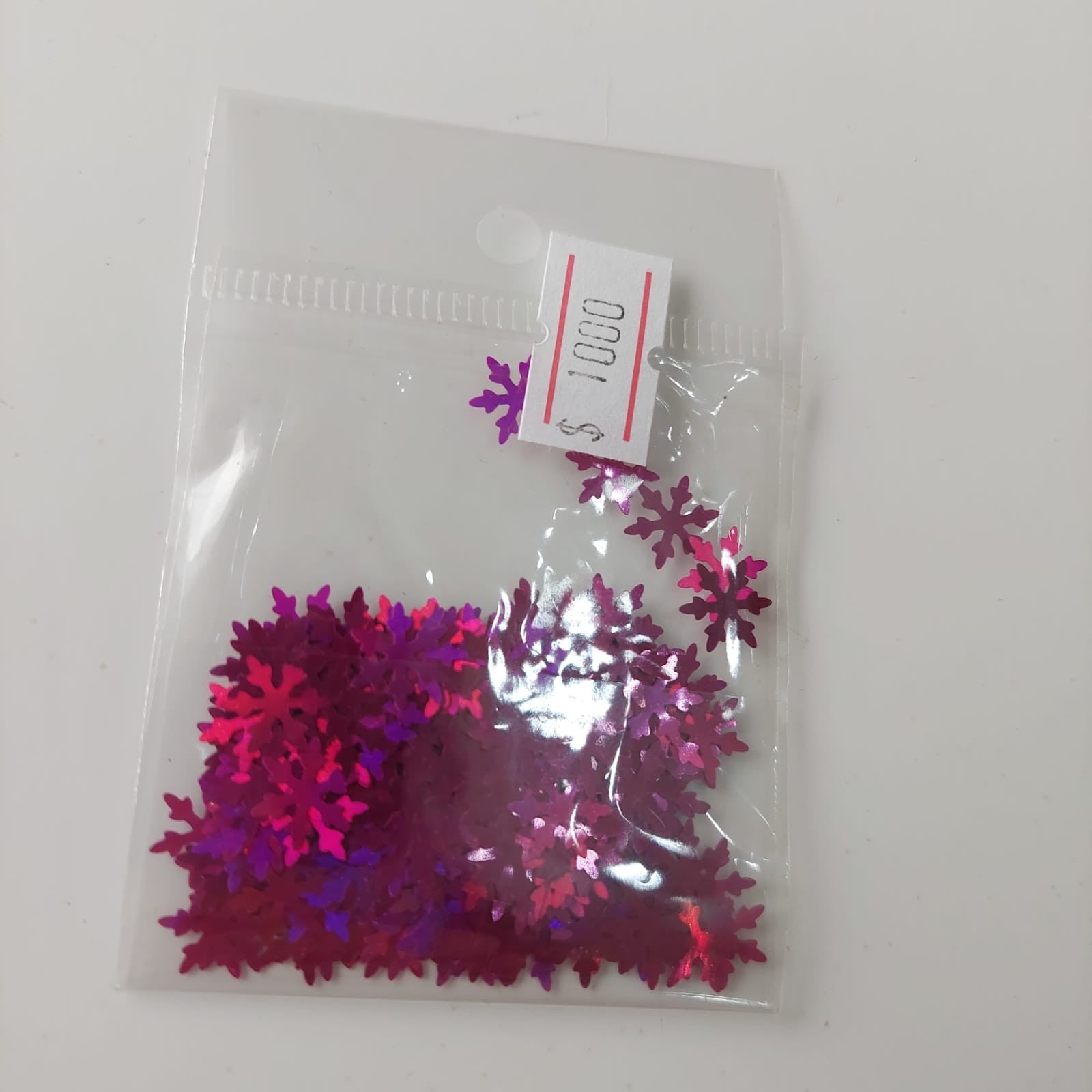 Confeti copos de nieve fuchsia