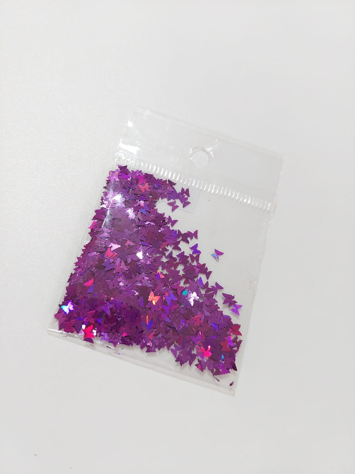 Confeti mariposa morado metalico