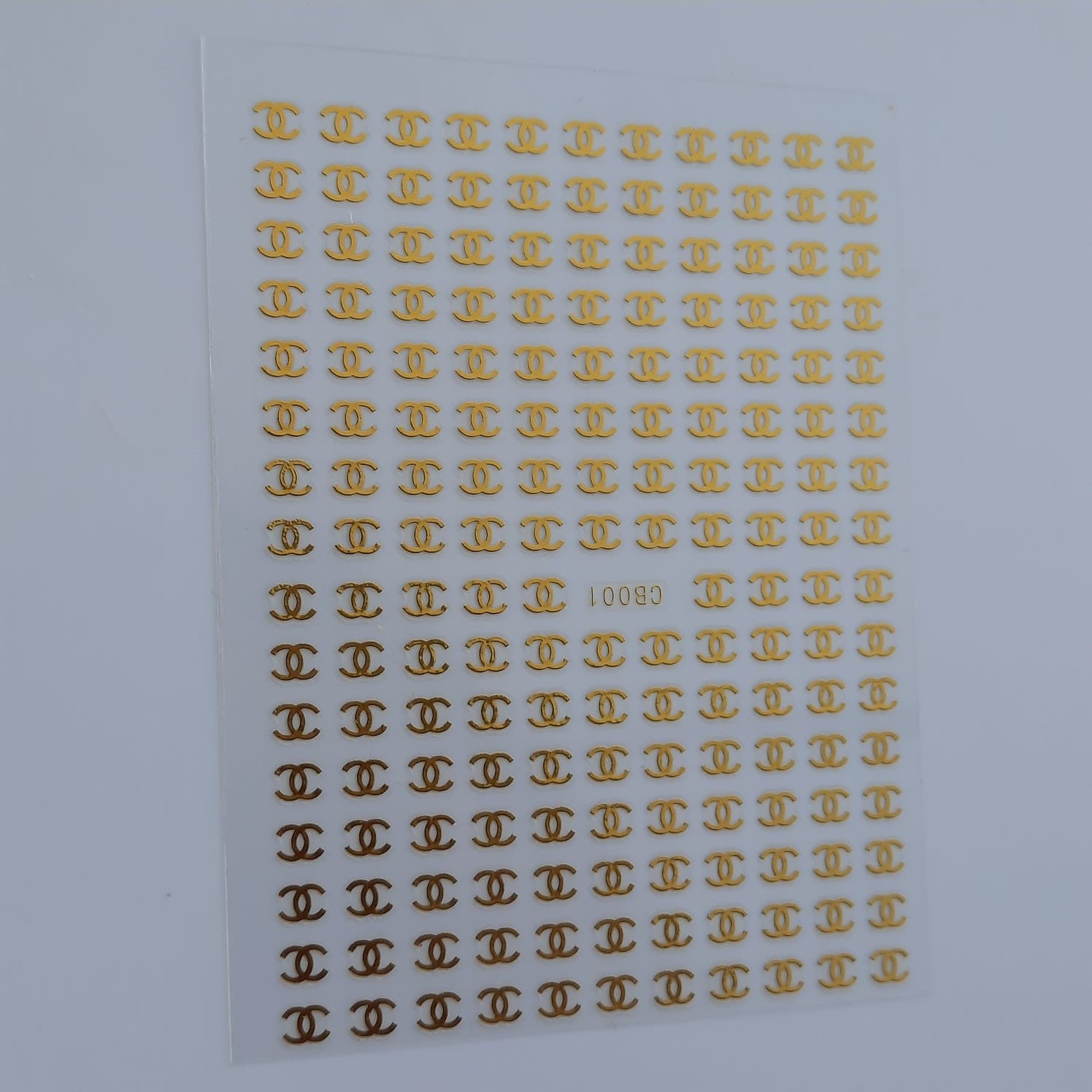 Sticker chanel dorado