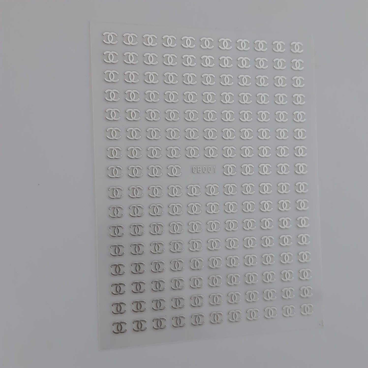 Sticker chanel plateado