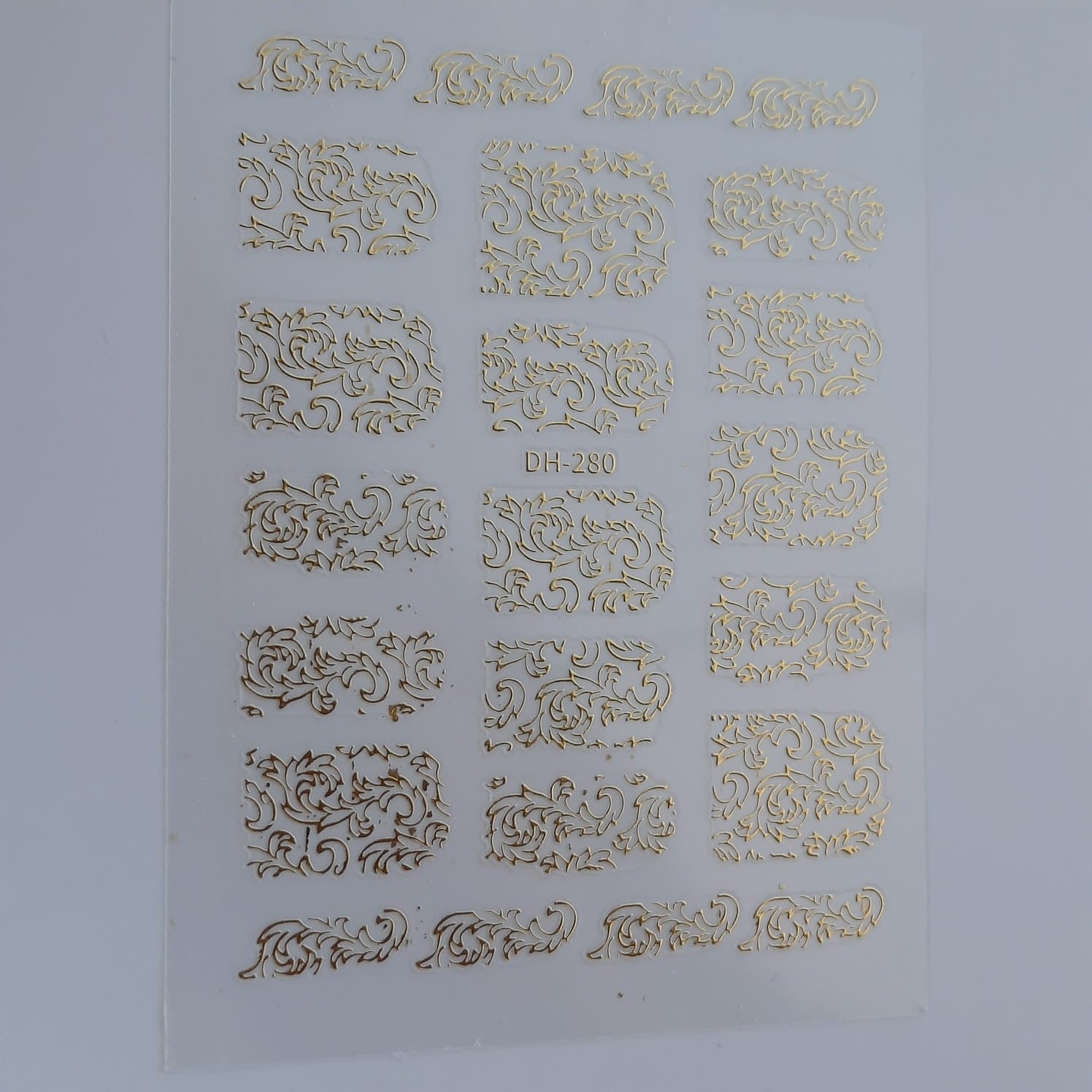 Sticker diseño dorado 9