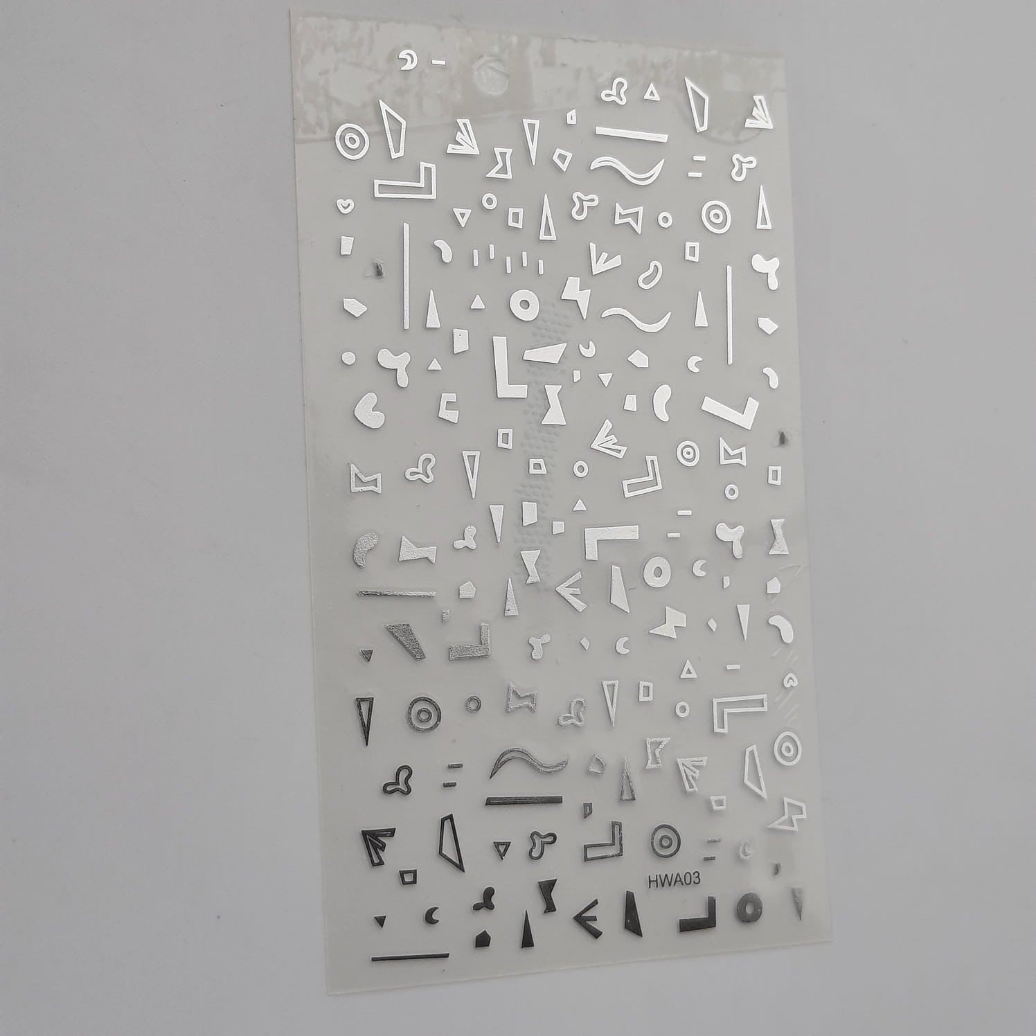 Sticker geometrico plateado