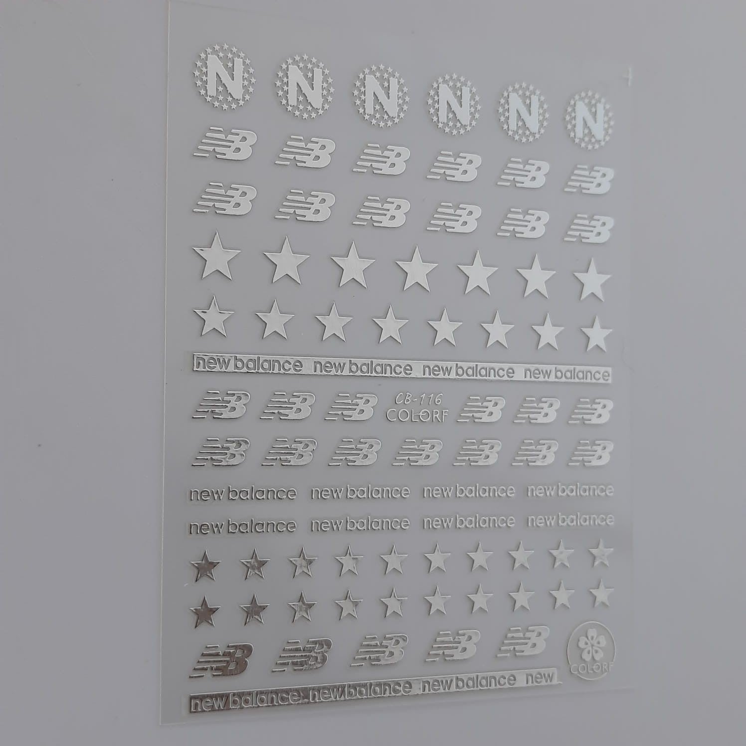 Sticker new balance plateado