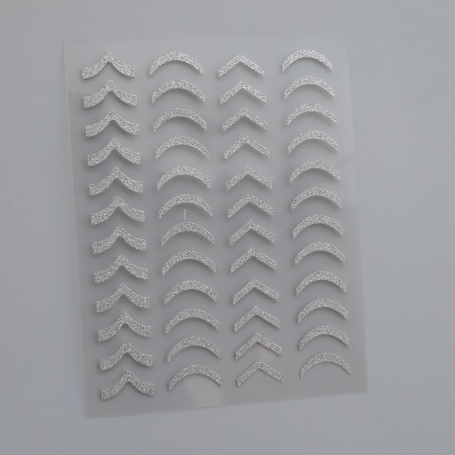 Sticker reflectivo curvas plateadas