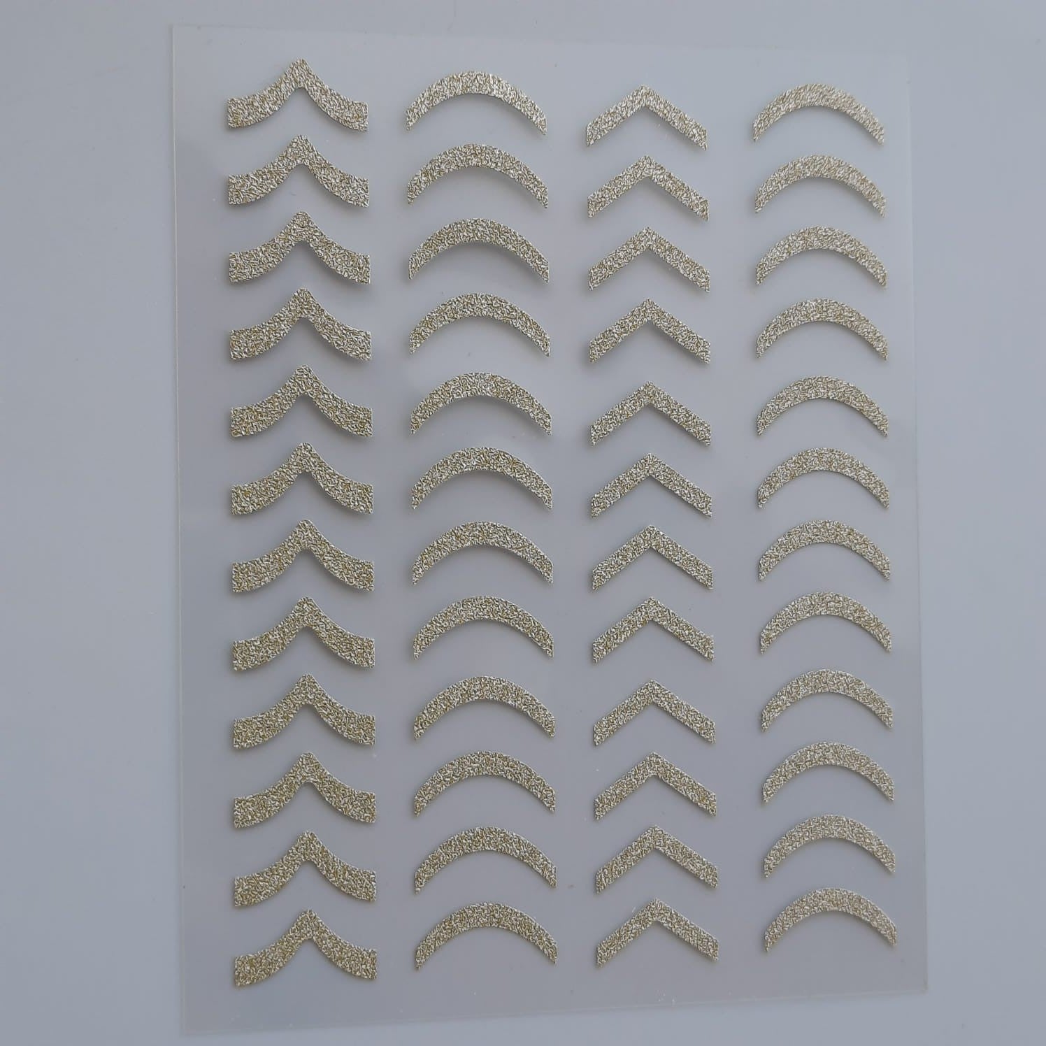 Stickers reflectivo curvas doradas