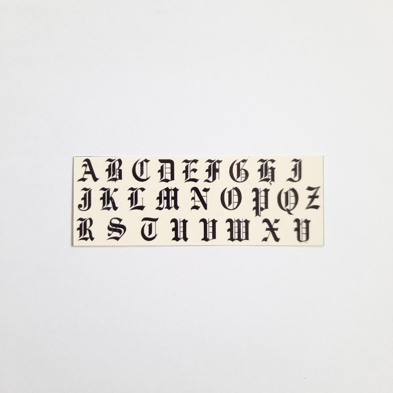 Tatuaje al agua letras goticas S Miawsticker